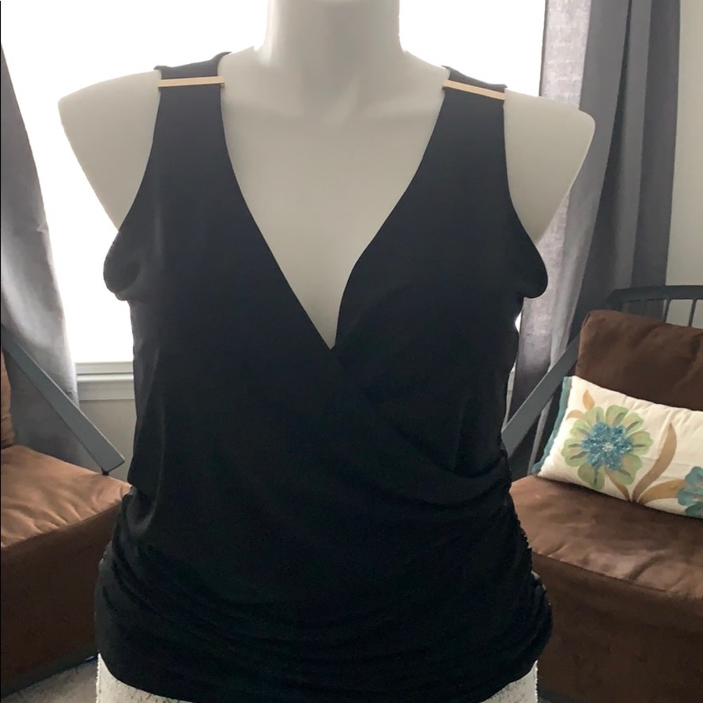 Sleeveless v-neck faux wrap shirt
